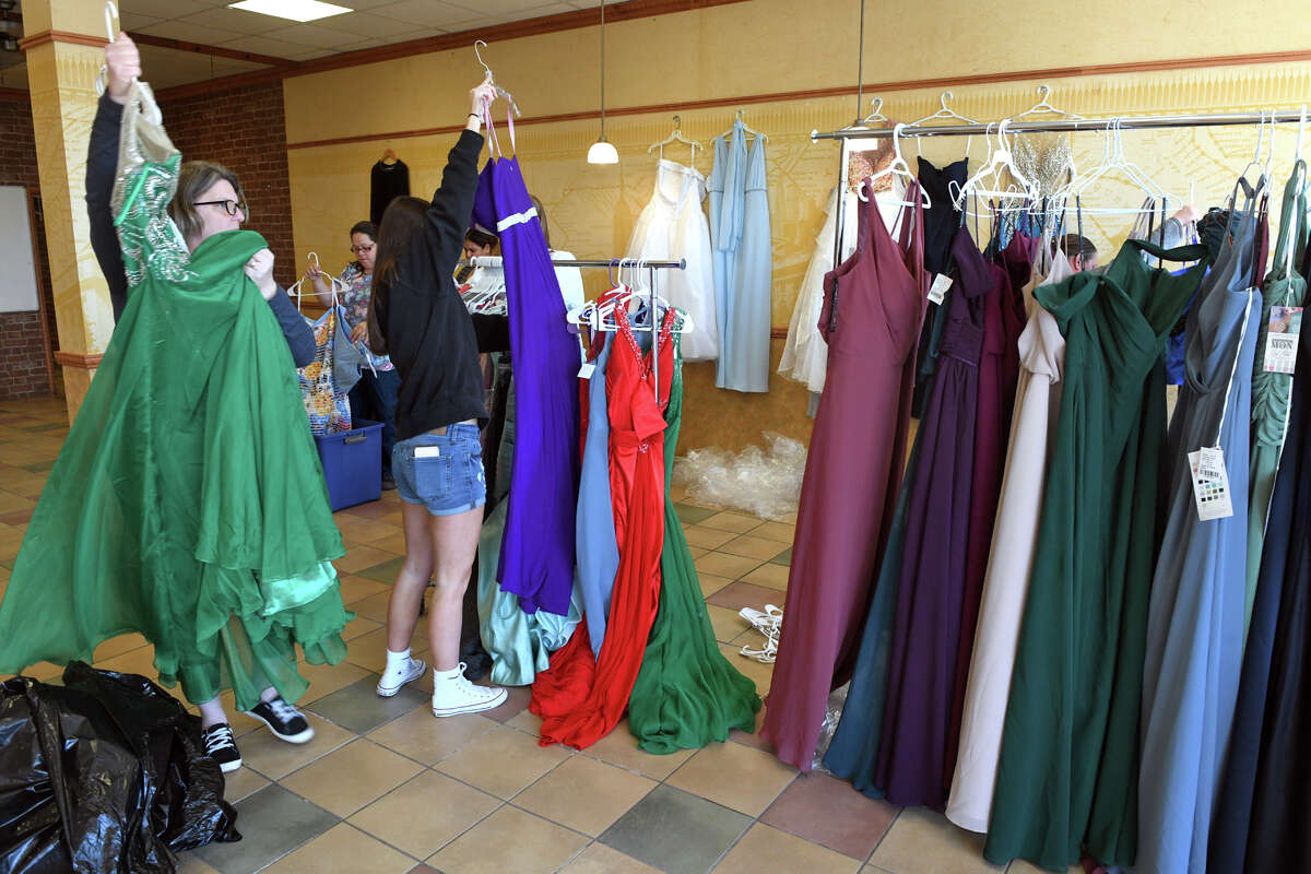 West Haven cheerleaders operating prom dress boutique for all