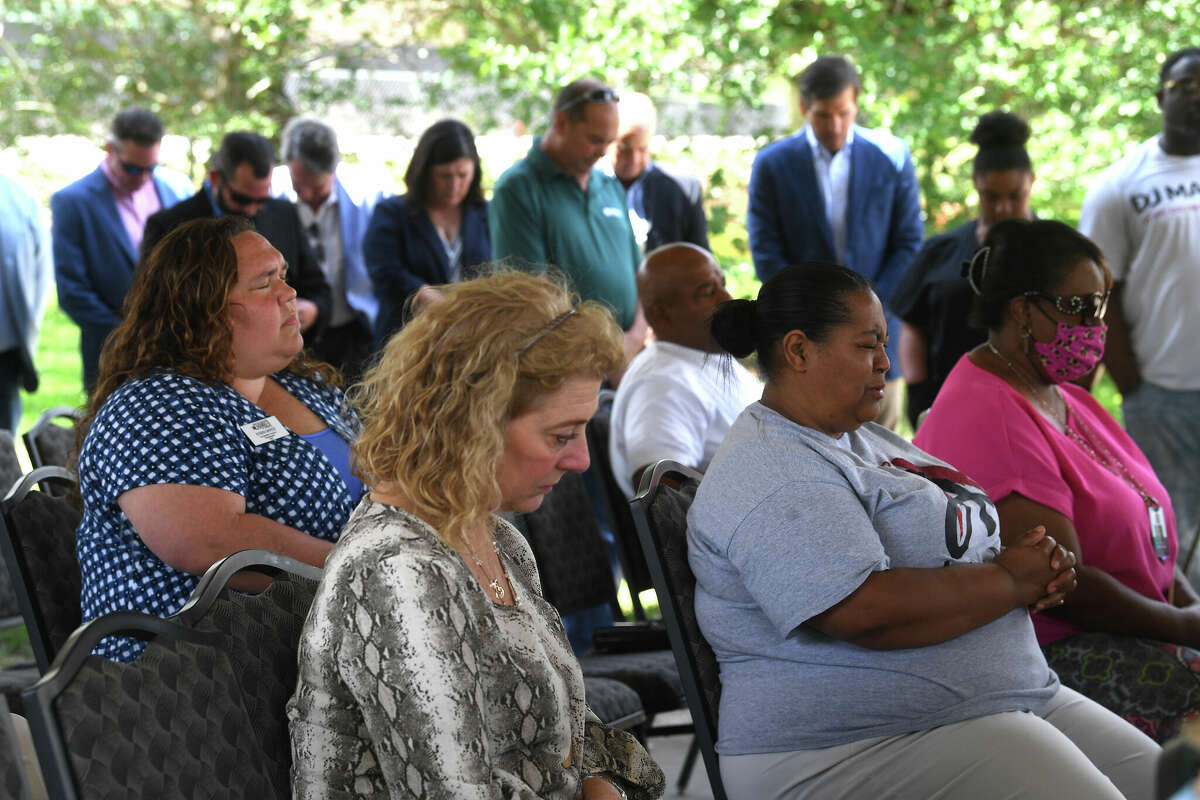 The crowd observes an opening prayer during a groundbreaking ceremony to kick off the Riverfront Park restoration project. Photo made Tuesday, April 11, 2023 Kim Brent/Beaumont Enterprise