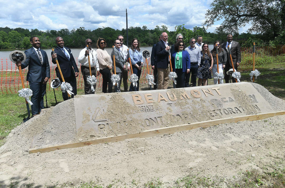 Attendees take more photos after dthe groundbreaking ceremony to kick off the Riverfront Park restoration project. Photo made Tuesday, April 11, 2023 Kim Brent/Beaumont Enterprise