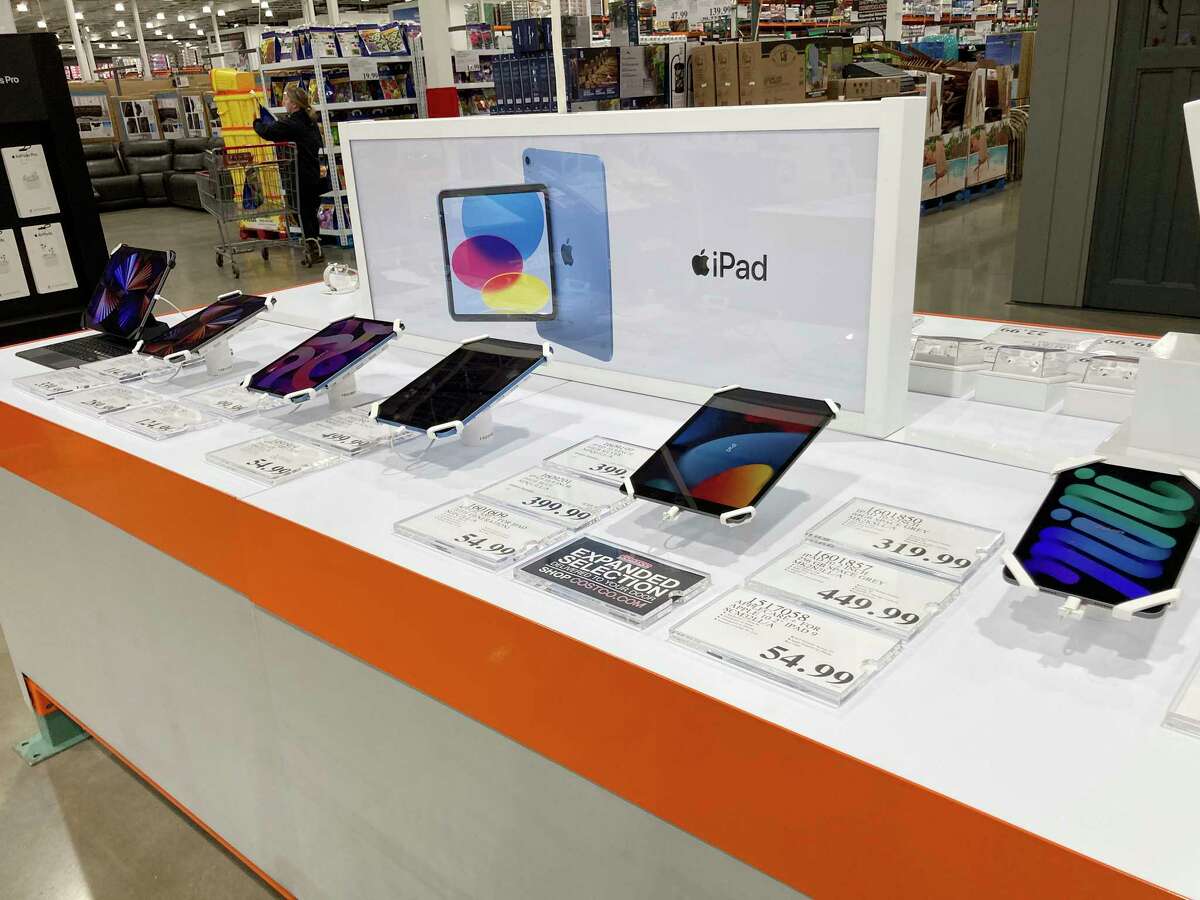 File - Apple iPads are displayed at a Costco warehouse on Monday, Feb. 21, 2023, in Sheridan, Colo. On Wednesday, the Labor Department reports on U.S. consumer prices for March.