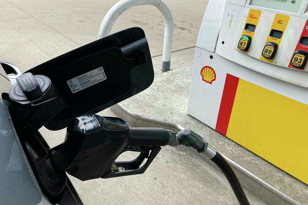 File - Fuel is pumped into a vehicle at a gas station in Mundelein, Ill., Tuesday, Feb. 14, 2023. On Wednesday, the Labor Department reports on U.S. consumer prices for March.