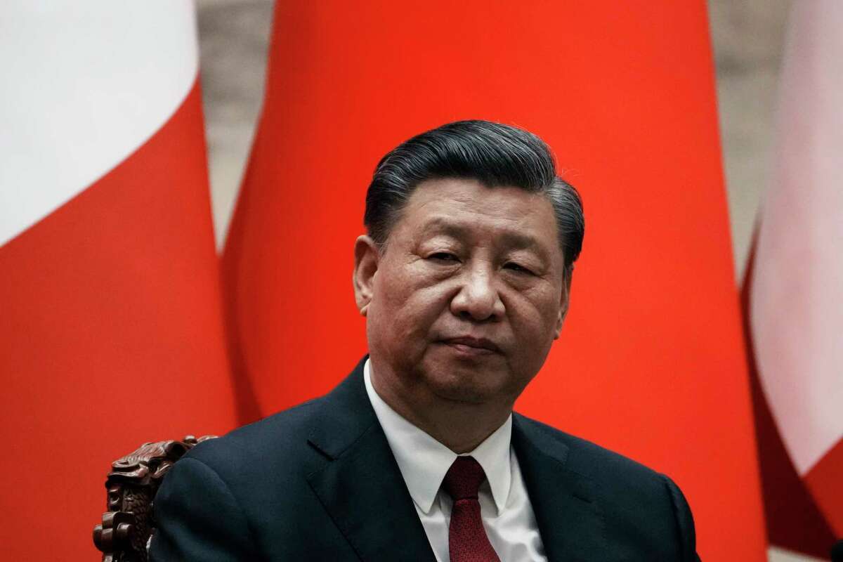 FILE - Chinese President Xi Jinping gives a joint press conference with France's President Emmanuel Macron at the Great Hall of the People in Beijing, China, Thursday, April 6, 2023. Brazil's President Luiz Inácio Lula da Silva flew off to China on Tuesday to strengthen ties with his nation's biggest trade partner and win support for his long-shot push for peace in Ukraine. China and Brazil are expected to sign at least 20 bilateral agreements during Lula's two-day stay, according to the presidential palace. He will visit Shanghai and Beijing, and meet his counterpart Xi Jinping on Apr. 14.