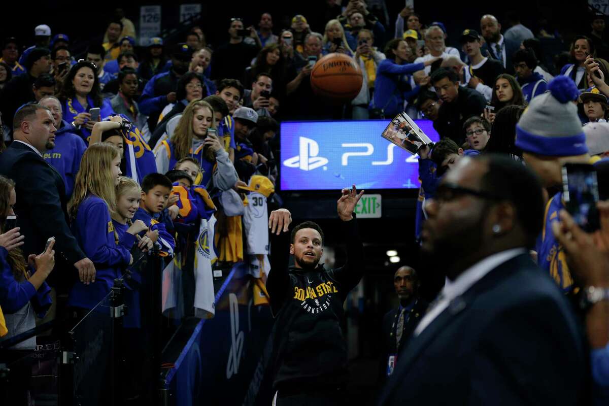 Steph Curry drains a shot from the tunnel in pregame warmups (GIF)