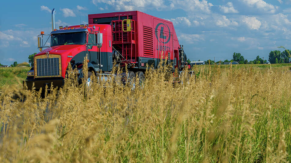 Liberty Oilfield Services' Tier 4 Dual Fuel Fleet is shown. Liberty has launched has launched Liberty Power Innovations to provide alternative fuel and power solutions, including CNG, which is used by the Dual Fuel Fleet.
