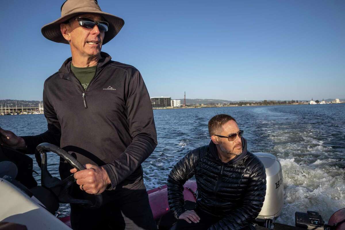 The California Recovery Divers team consisting of David McMurdie (left) and Kevin Haugh hit the water in the Brooklyn Basin off Alameda.  The team is a group of trained volunteers who search for and recover missing persons in the waters of Northern California.