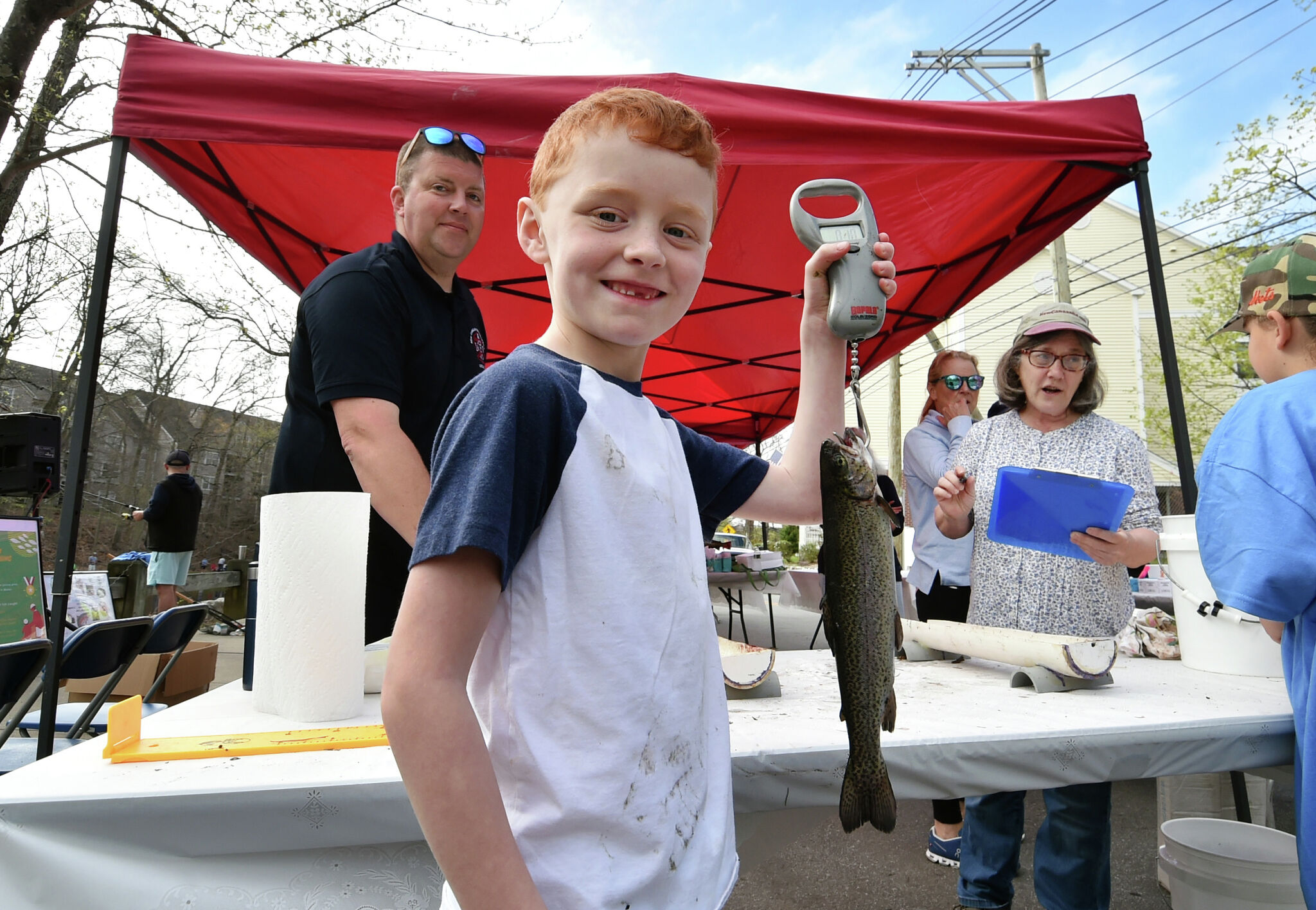In Photos: Fishing derby in New Canaan brings out families