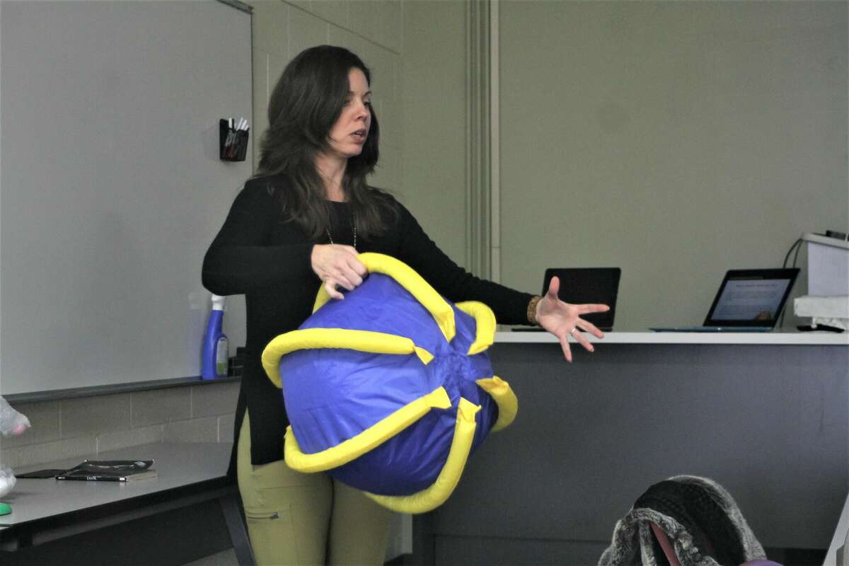 Sarah Stargardt, Manistee Intermediate School District's teacher consultant for the visually impaired, discussed the various assistive technologies used in Manistee County Schools March 21 during the Manistee ISD school board meeting.