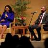 Mayor London Breed, left, and Board President Shamann Walton sit onstage during the event, 