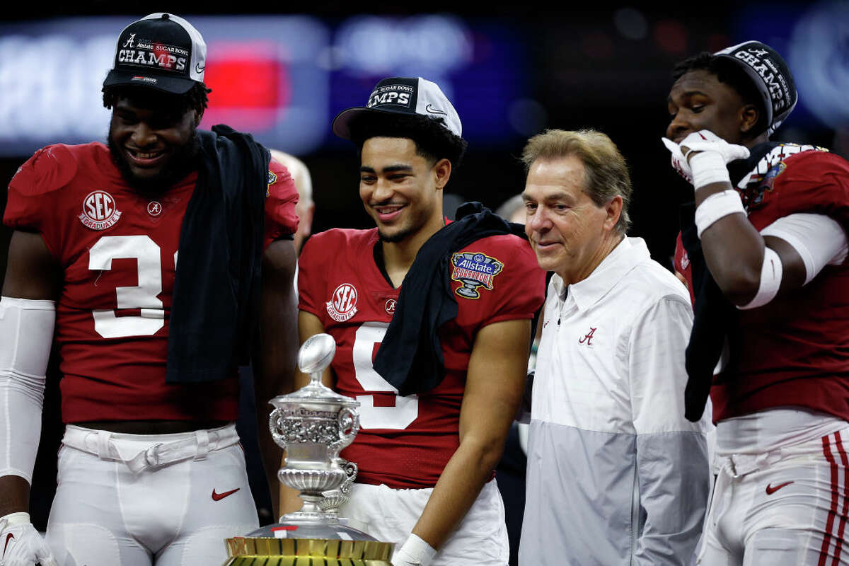 Head coach Nicku00a0Saban celebrates with Will Anderson Jr. #31, Jordan Battle #9, and Bryce Young #9 of the Alabama Crimson Tide after defeating the Kansas State Wildcats 45-20 in the Allstate Sugar Bowl at Caesars Superdome on December 31, 2022 in New Orleans, Louisiana.