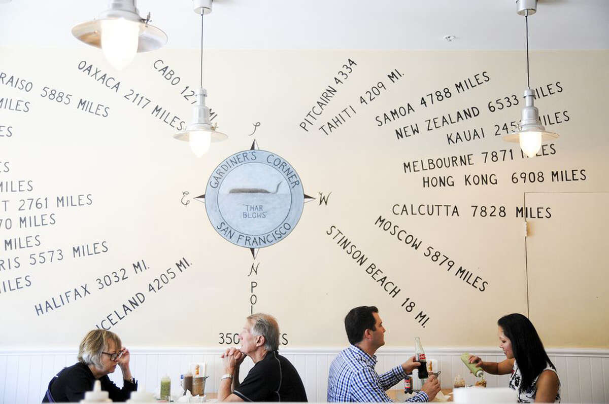 Customers dine inside Tacko restaurant at 3115 Fillmore St. in San Francisco.