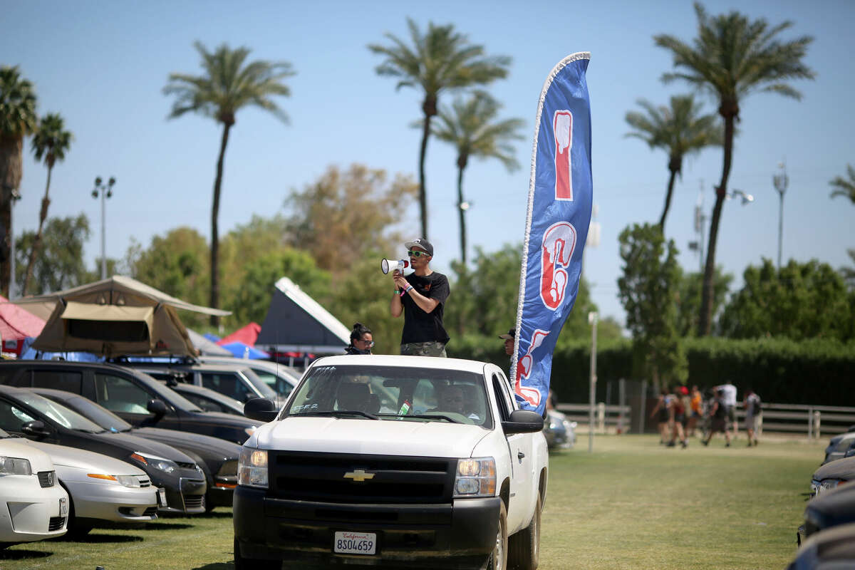 FILE: Men bring ice to campground festivalgoers during Day 3 of the 2016 Coachella Valley Music And Arts Festival Weekend 1 at the Empire Polo Club on April 17, 2016, in Indio, Calif.