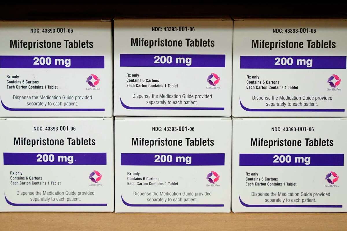 FILE - Boxes of the drug mifepristone sit on a shelf at the West Alabama Women's Center in Tuscaloosa, Ala., on March 16, 2022. The Supreme Court is facing a self-imposed Friday, April 21, 2023, night deadline to decide whether women’s access to a widely used abortion pill will stay unchanged until a legal challenge to its Food and Drug Administration approval is resolved.