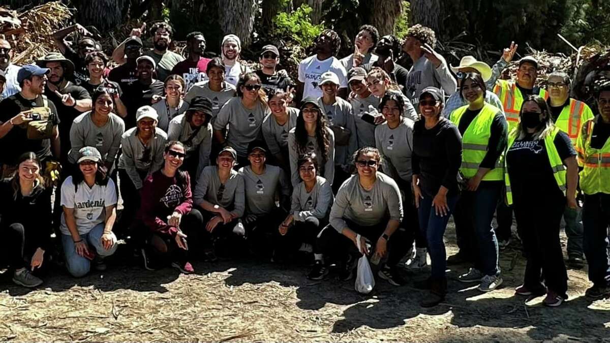 TAMIU athletics partnered with the City of Laredo to Adopt a Park and did so at Las Palmas Nature Trail.