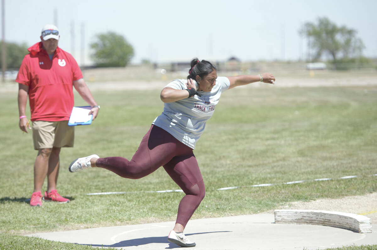 Legacy senior Leah Acosta throws the shot put during the Districts 1-6A/2-6A Area Track and Field Championships, April 21 at Ratliff Stadium in Odessa. 