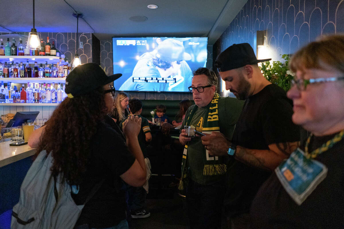 The A's showed love to their Oakland neighbors with Warriors