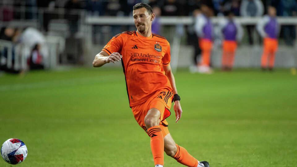 SAN JOSE, CA - APRIL 1: Daniel Steres #5 of the Houston Dynamo passes the ball during a game between Houston Dynamo FC and San Jose Earthquakes at PayPal Park on April 1, 2023 in San Jose, California. (Photo by Lyndsay Radnedge/ISI Photos/Getty Images)