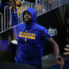 Warriors' Draymond Green takes the court for warm-up against the Sacramento Kings in Game 4 at Chase Center on April 23, 2023 in San Francisco, California.