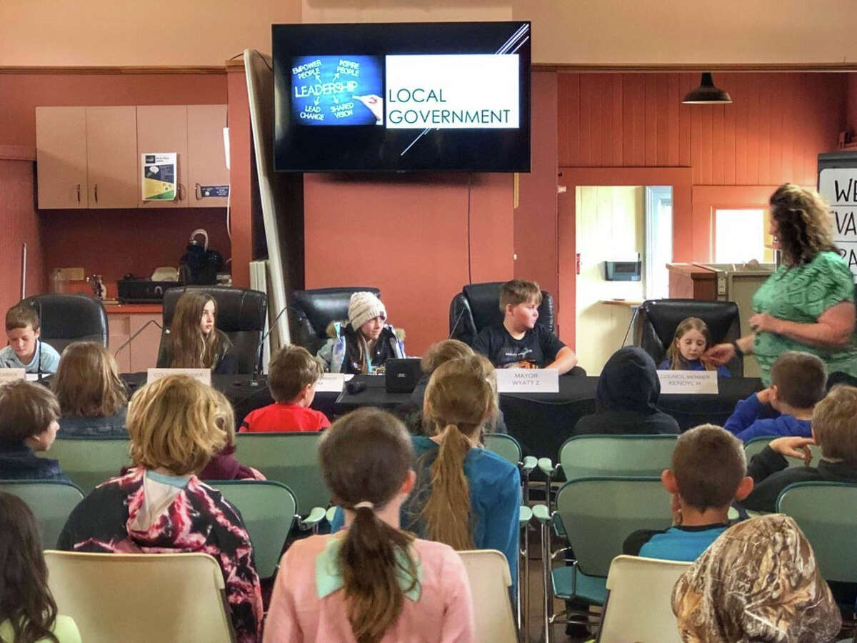 Evart students learn city government in mock council meeting