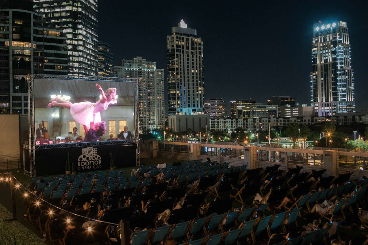 Watch movies under the stars at the Rooftop Cinema Club Uptown in Houston, Texas.