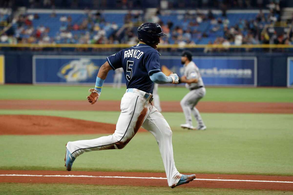Tampa Bay Rays' Wander Franco runs down the third baseline to score on an RBI-triple by Randy Arozarena against the Houston Astros during the first inning of a baseball game Monday, April 24, 2023, in St. Petersburg, Fla.