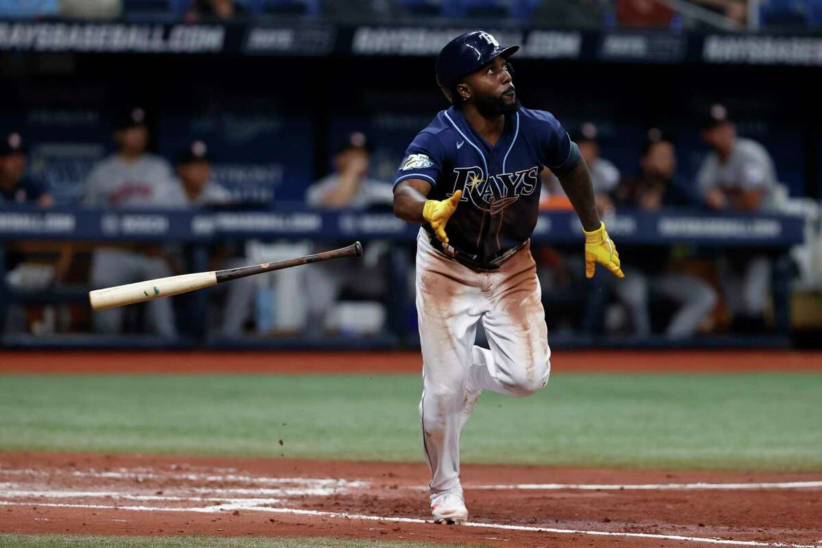 Tampa Bay Rays' Randy Arozerena hits a sacrifice fly to right field against the Houston Astros during the third inning of a baseball game Monday, April 24, 2023, in St. Petersburg, Fla.