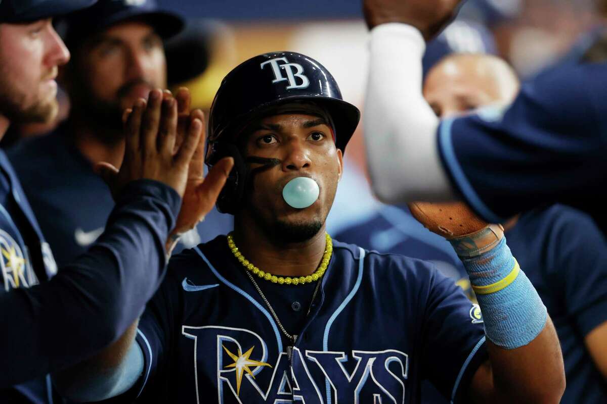 Tampa Bay Rays' Wander Franco celebrates in the dugout after scoring against the Houston Astros during the third inning of a baseball game Monday, April 24, 2023, in St. Petersburg, Fla.