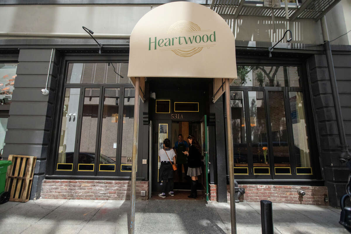 Customers enter Heartwood in San Francisco's Financial District on April 25, 2023.
