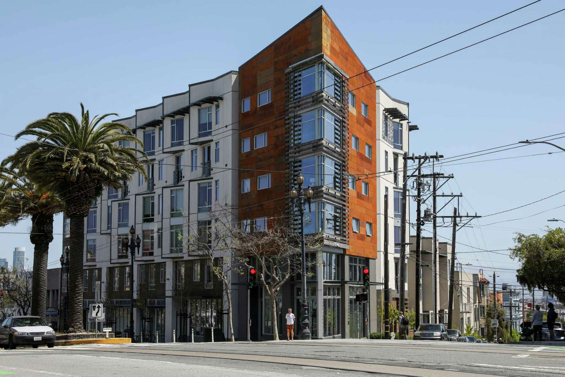 A flatiron building stands at 2175 Market in San Francisco.