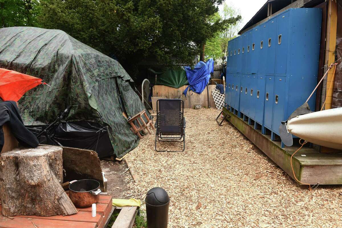 On New Haven's Rosette Street, backyard encampment grows