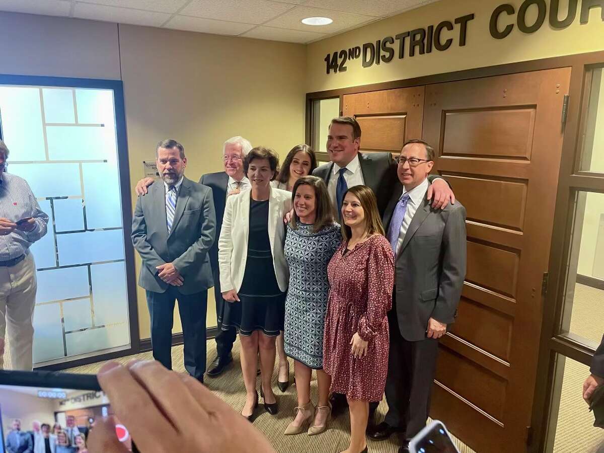  Front row, left to right: Todd Freese, Adrianne Clifton, Shelby Hammer, Chrystal Myers. Attorneys on the back row: Dan Hurley, Allison Clayton, Frank Sellers and Brian Carney.