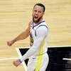 Stephen Curry (30) celebrates after he made a basket and was fouled late in the second half as the Golden State Warriors played the Sacramento Kings in Game 5 of the NBA Western Conference first round Playoffs at Golden 1 Center in Sacramento, Calif., on Wednesday, April 26, 2023.