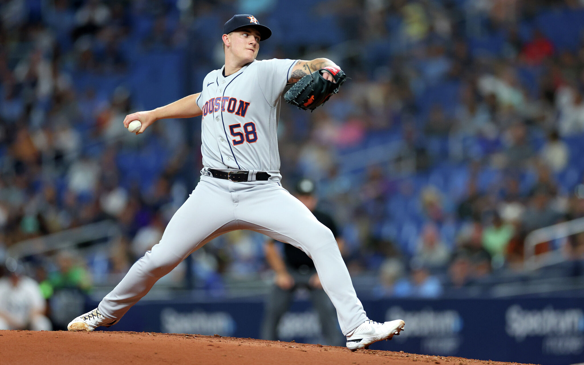 ATLANTA, GA - APRIL 21: Houston Astros starting pitcher Hunter Brown (58)  delivers a pitch during the MLB game between the Atlanta Braves and  defending World Series Champion Houston Astros on April