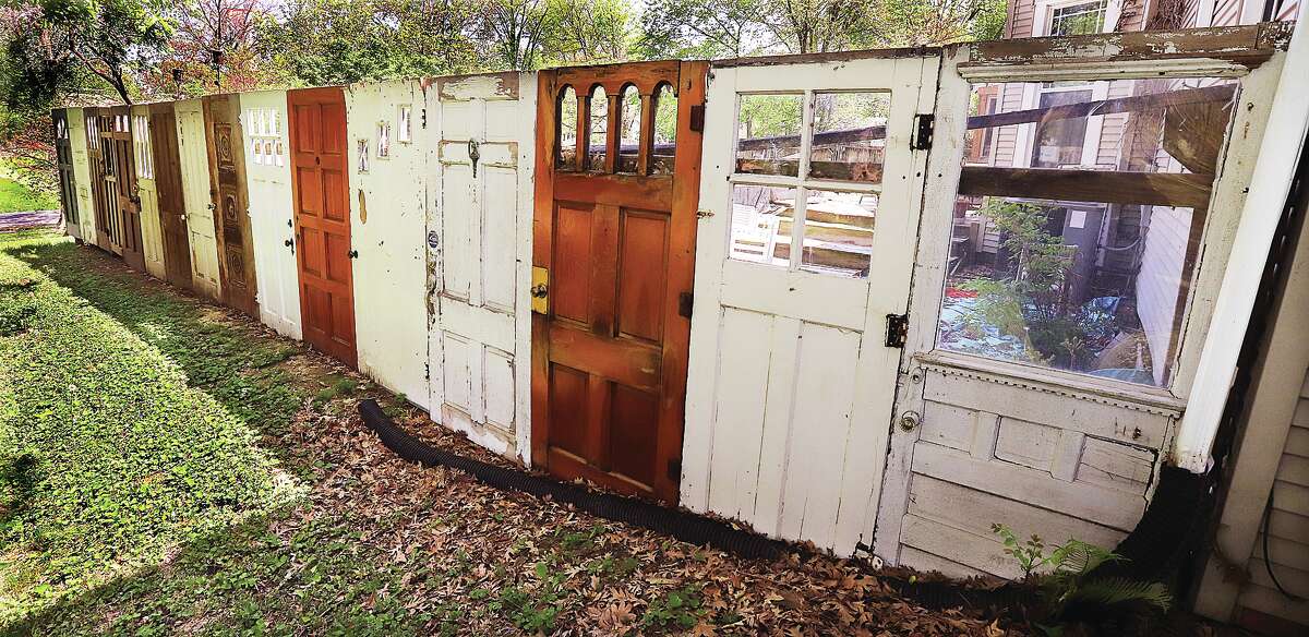 It wasn't Let's Make A Deal, but there were a lot of doors to choose from in the backyard of a house Wednesday in the 500 block of Peral Street in Godfrey. The creative homeowner has re-purposed doors to create one side of their backyard fence.