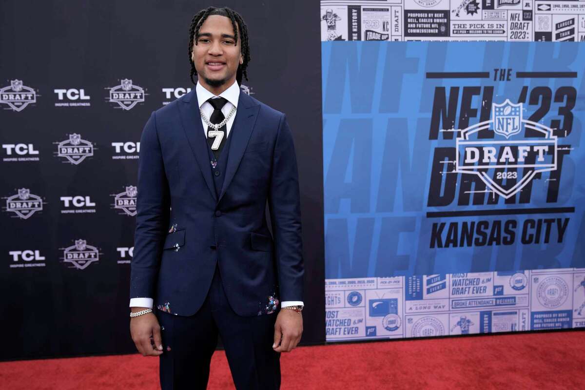 Ohio State quarterback C.J. Stroud arrives on the red carpet before the first round of the NFL football draft, Thursday, April 27, 2023, in Kansas City, Mo.