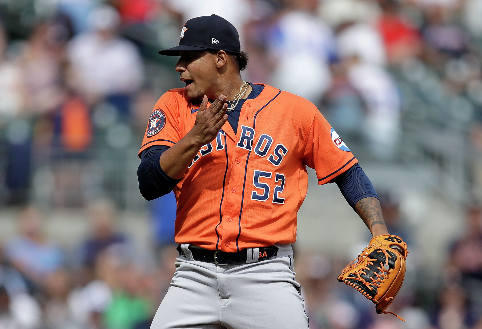 Houston Astros pitcher Bryan Abreu (52) delivers a pitch against