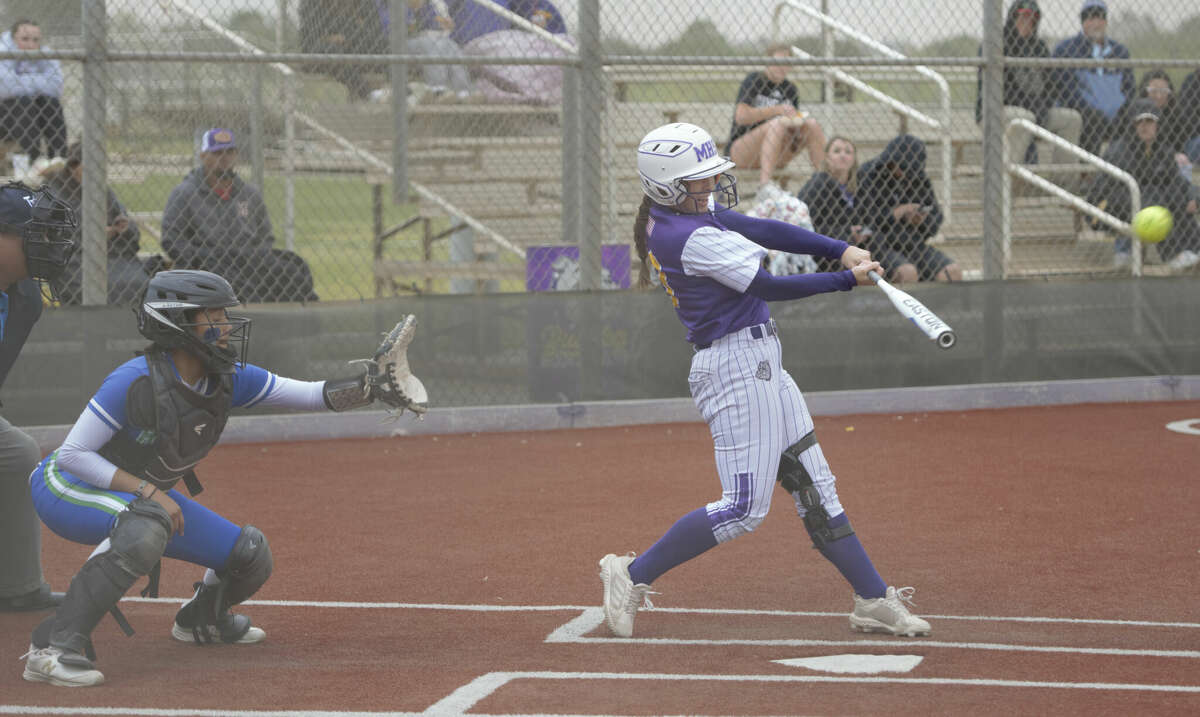 Midland High's Breigh Houser crushes an RBI double in front of El Paso Montwood catcher Gracie Ponzio during a Class 6A bi-district playoff game, April 28 at Martin Field. 