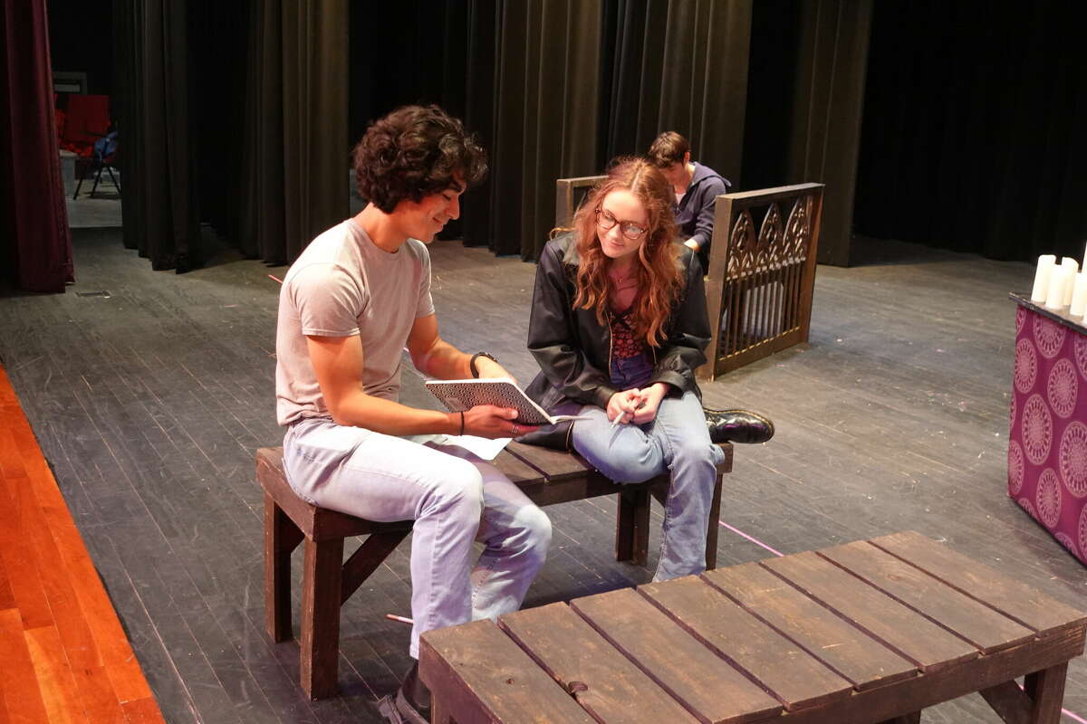 Sabine Pass theater students, seniors Caleb Daniels, left, Claire Londenberg, right, and freshman Abram Ramon, back, rehearse for the upcoming UIL State One-Act Play meet. Photo taken April 26, 2023. Photo by Olivia Malick/ The Enterprise.