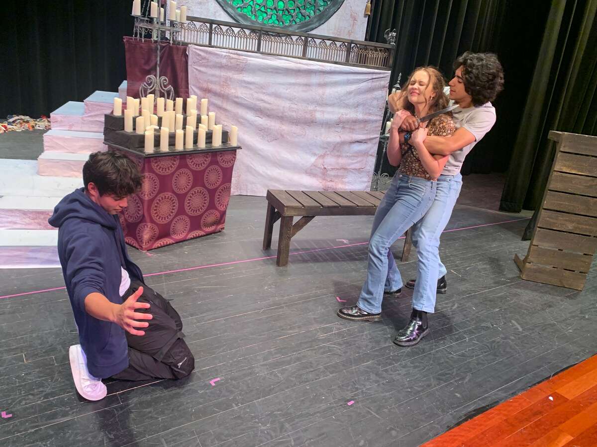 Sabine Pass theater students, freshman Abram Ramon, left, senior Claire Londenberg, center, and senior Caleb Daniels, right, rehearse for the upcoming UIL State One-Act Play meet. Photo taken April 26, 2023. Photo by Olivia Malick/ The Enterprise.