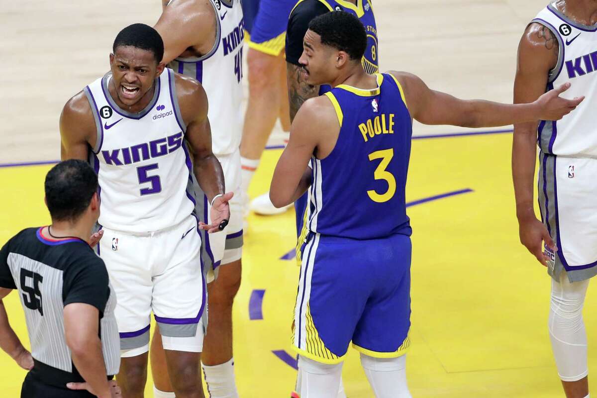 Sacramento’s De’Aaron Fox argues after being called for a technical foul after being fouled by Warriors guard Jordan Poole on Friday.