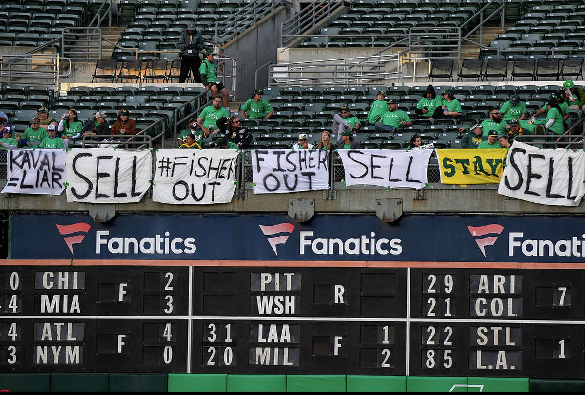 MLB corrects A's clip it had edited to remove signs criticizing owner