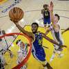 Andrew Wiggins (22) shoots in the first half as the Golden State Warriors played the Sacramento Kings in Game 6 of the NBA Western Conference Playoffs Round 1 at Chase Center in San Francisco, Calif., on Friday, April 28, 2023.