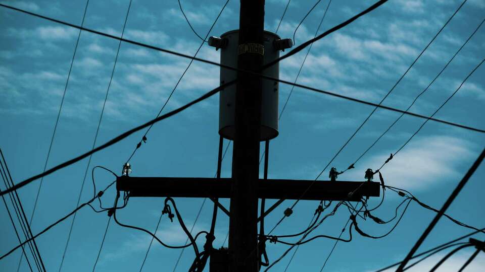 Power lines are seen in San Francisco on Tuesday, July 27, 2021. The city is renewing its campaign to take over the PG&E power lines that serve the city and Mayor London Breed announced that the city is formally requesting that the California Public Utilities Commission estimate how much the city's electric infrastructure worth