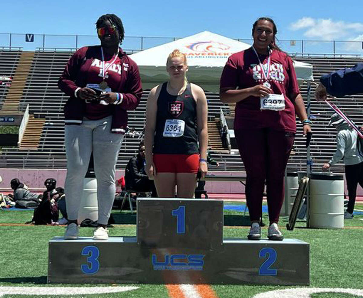 Legacy's Bolaji Subair, left, and Leah Acosta, right, qualified for the UIL state meet in the girls discus at the Region I-6A track and field meet, April 29 in Arlington. 