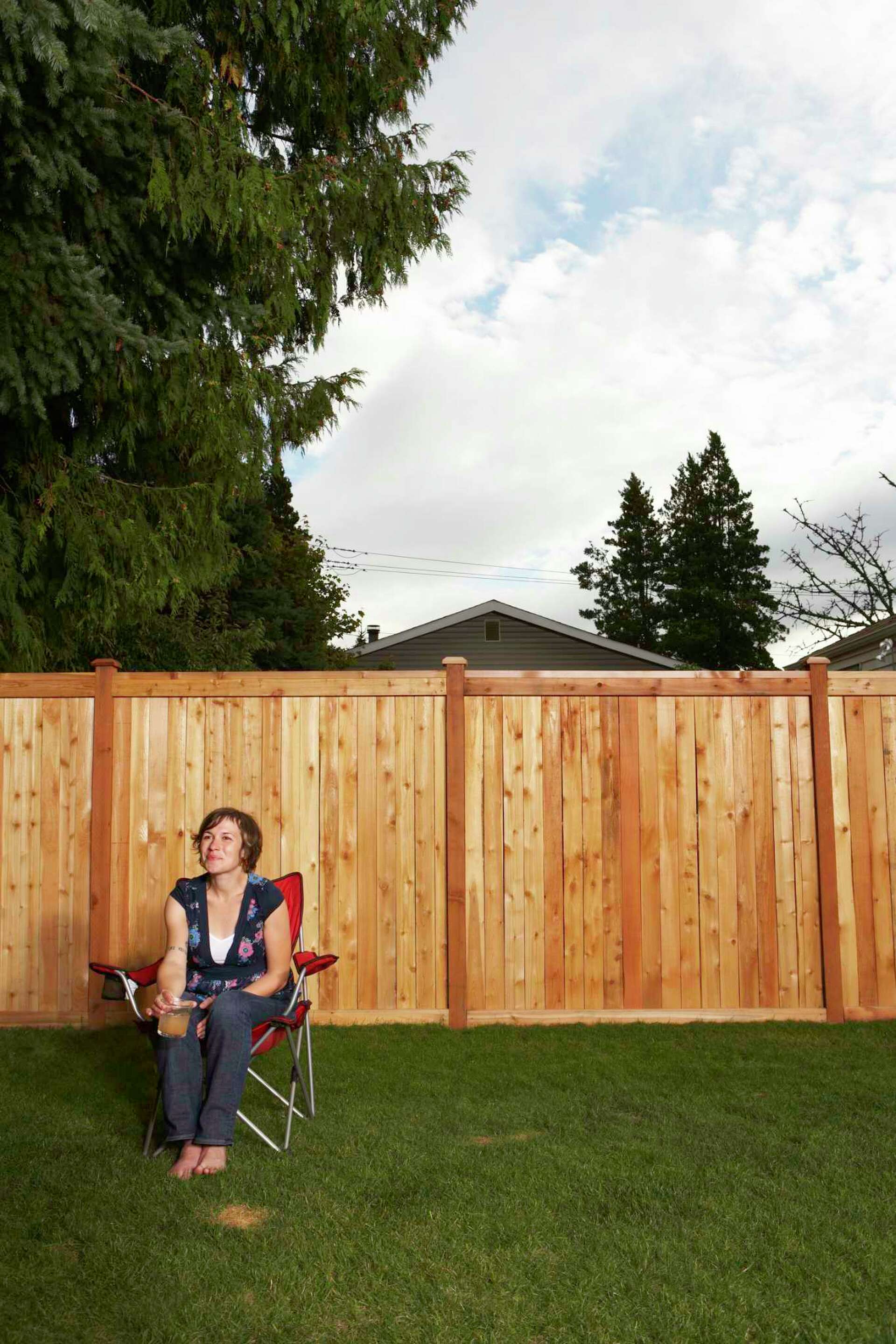 How to Convert a Chain-Link Fence to a Wooden Fence