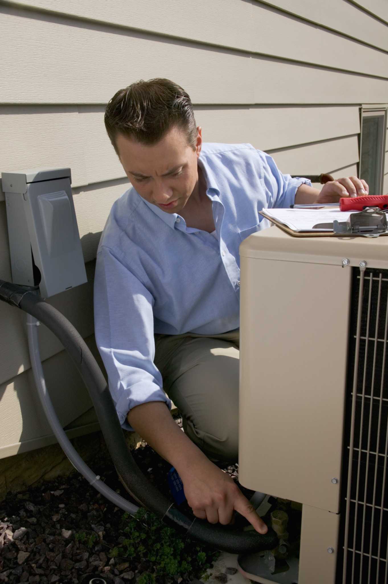 How to Clean Slime From a Drip Tray in a Vertical A-Coil Air Conditioner