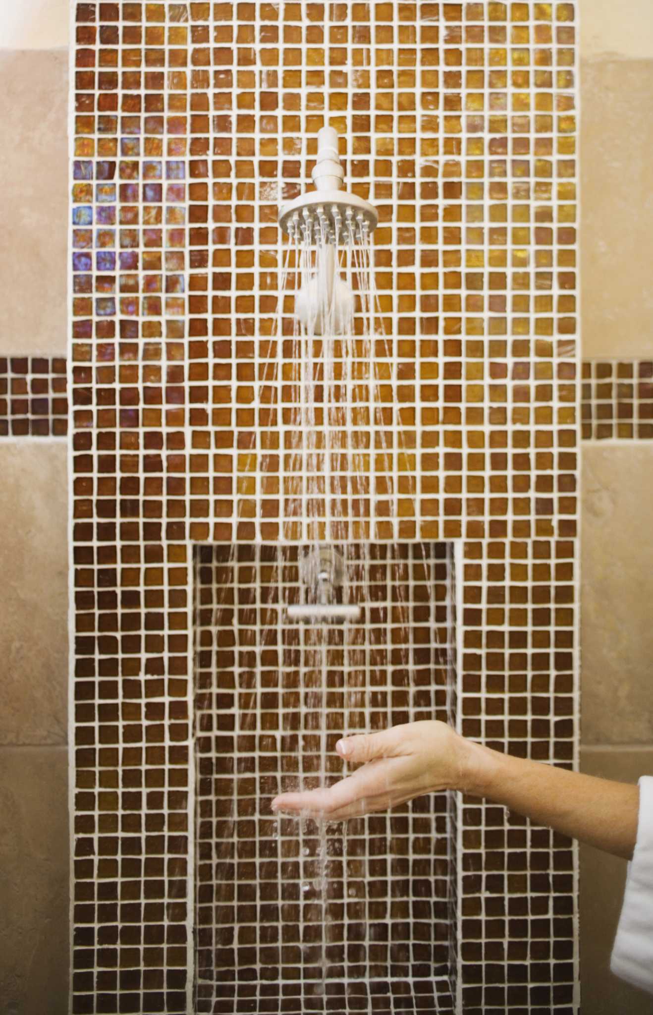 How to Replace a Prefabricated Shower With a Tile Stall Shower