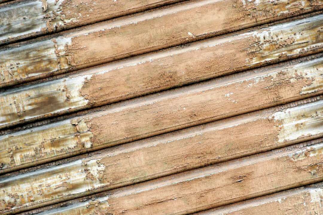 How to Cover Paneling With Drywall Compound