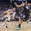 Golden State Warriors’ Stephen Curry drives against Sacramento Kings’ Trey Lyles during 1st quarter of Game 7 of NBA Western Conference 1st Round Playoffs at Golden 1 Center in Sacramento, Calif., on Sunday, April 30, 2023.
