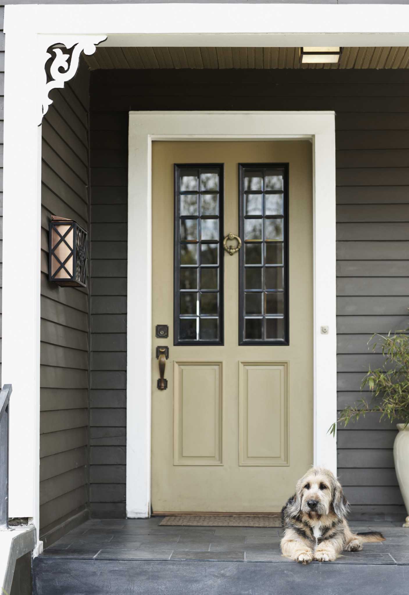 What Are the Steps for Painting a Newly Hung Wooden Exterior Door?
