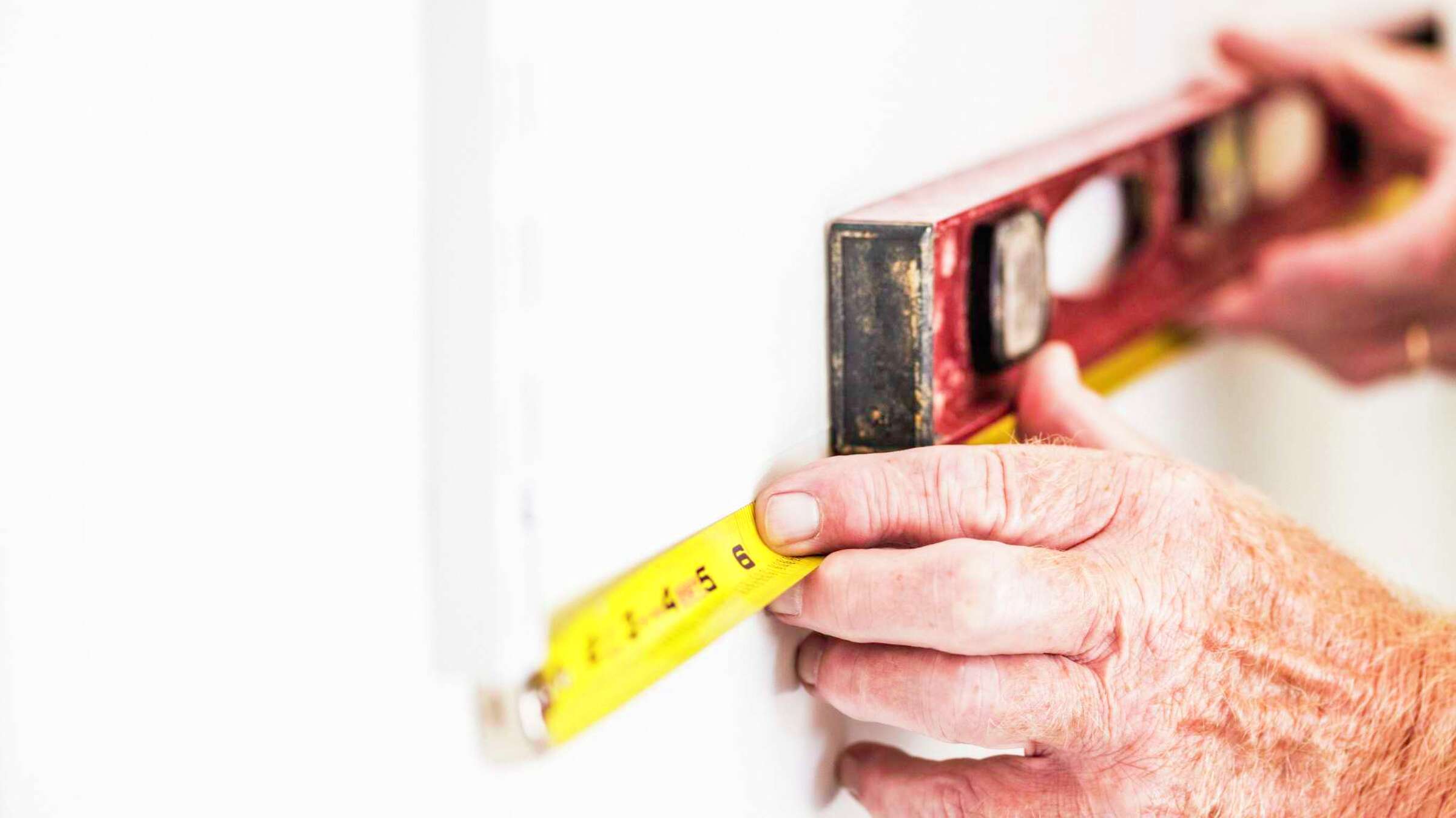 How Do I Anchor Shelves Into a Plaster Wall?